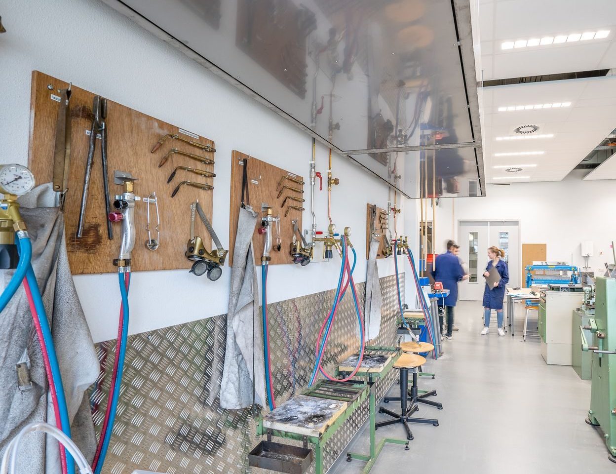A prototype on a workbench in a bright innovation workshop.