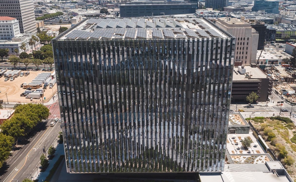 The facade of a federal courthouse in clear daylight, architecture only, no people.